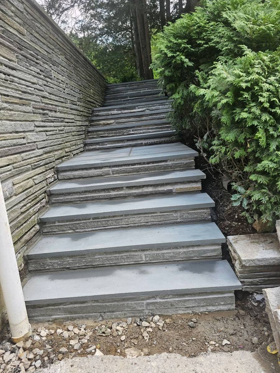 Finished bluestone steps with stone risers